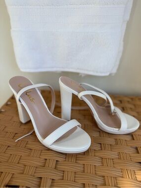 Lulu’s White Heels